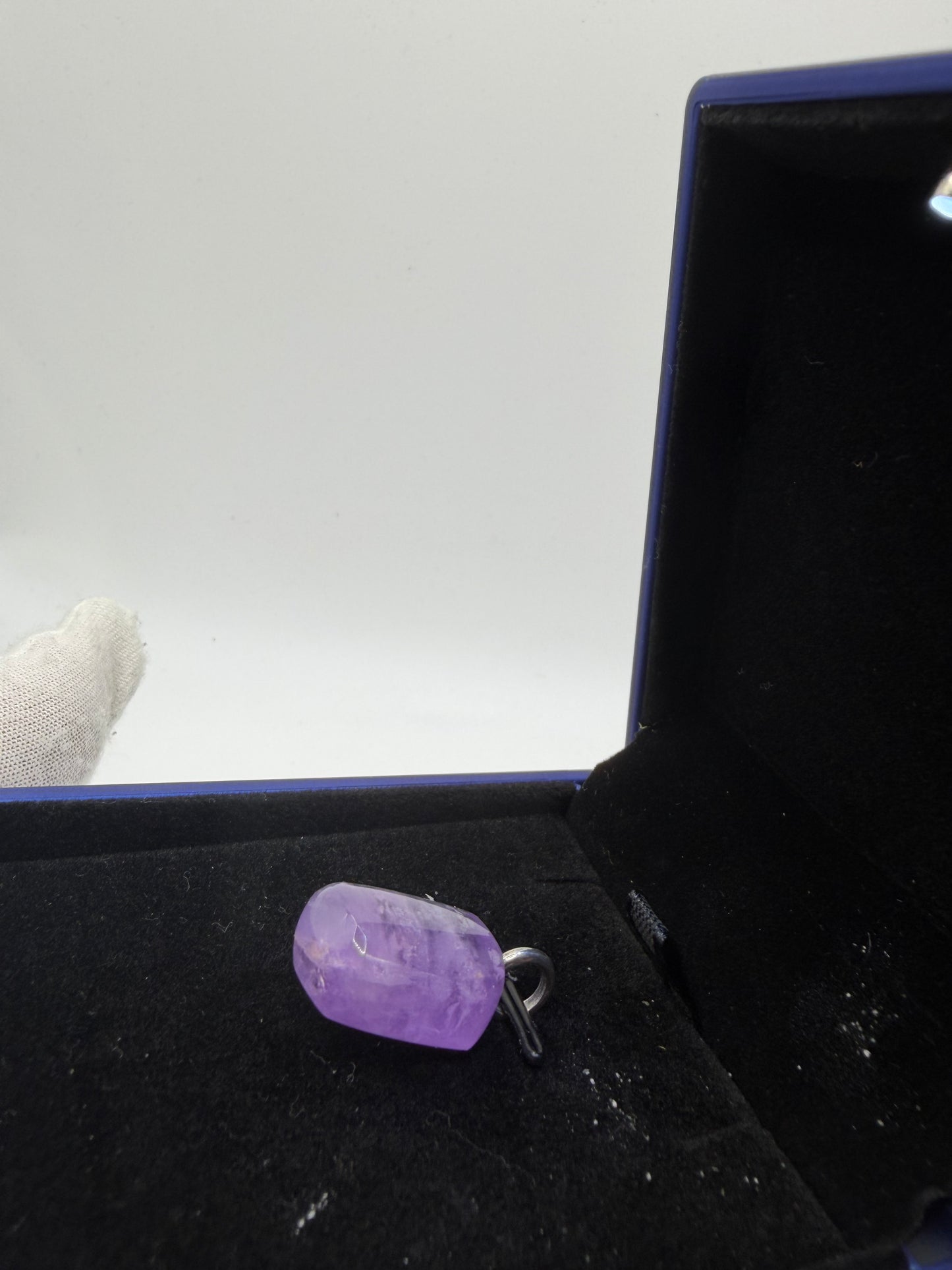 Detail of 31ct Rwandan Amethyst pendant stone surface — deep purple natural gemstone, handcrafted in Maine