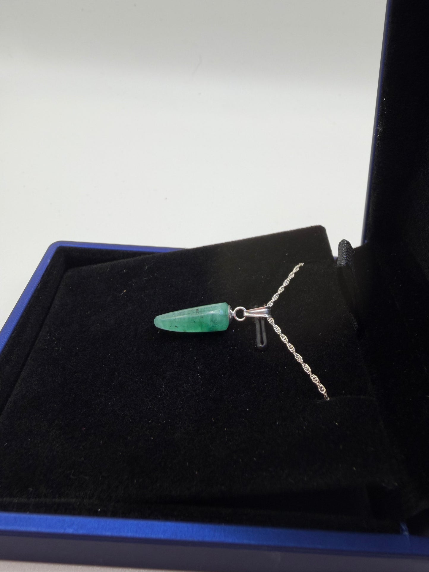 Colombian emerald pendant in lighted display box included with purchase