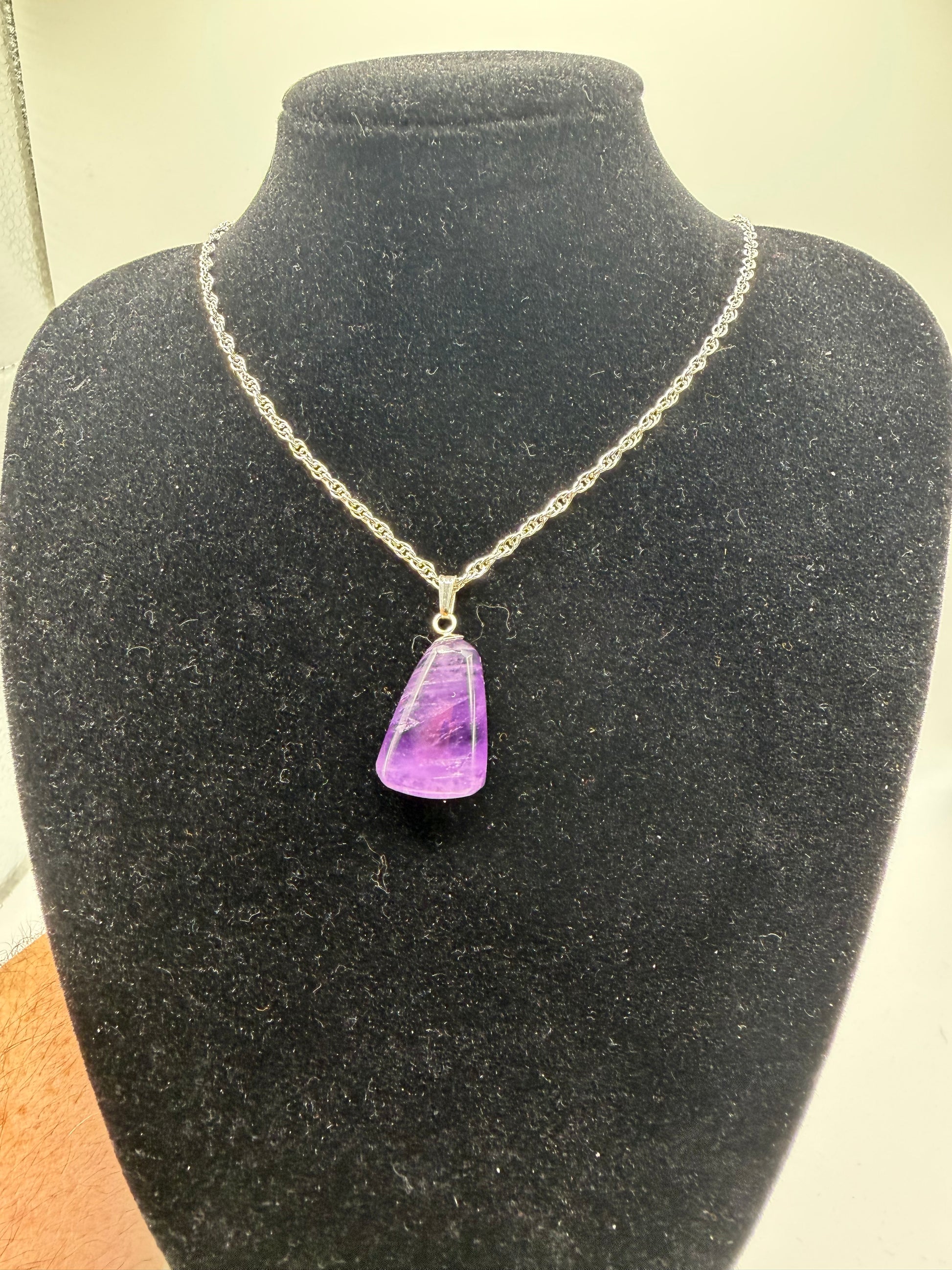 21ct natural Rwandan amethyst pendant with sterling silver bail, deep violet gemstone, front view