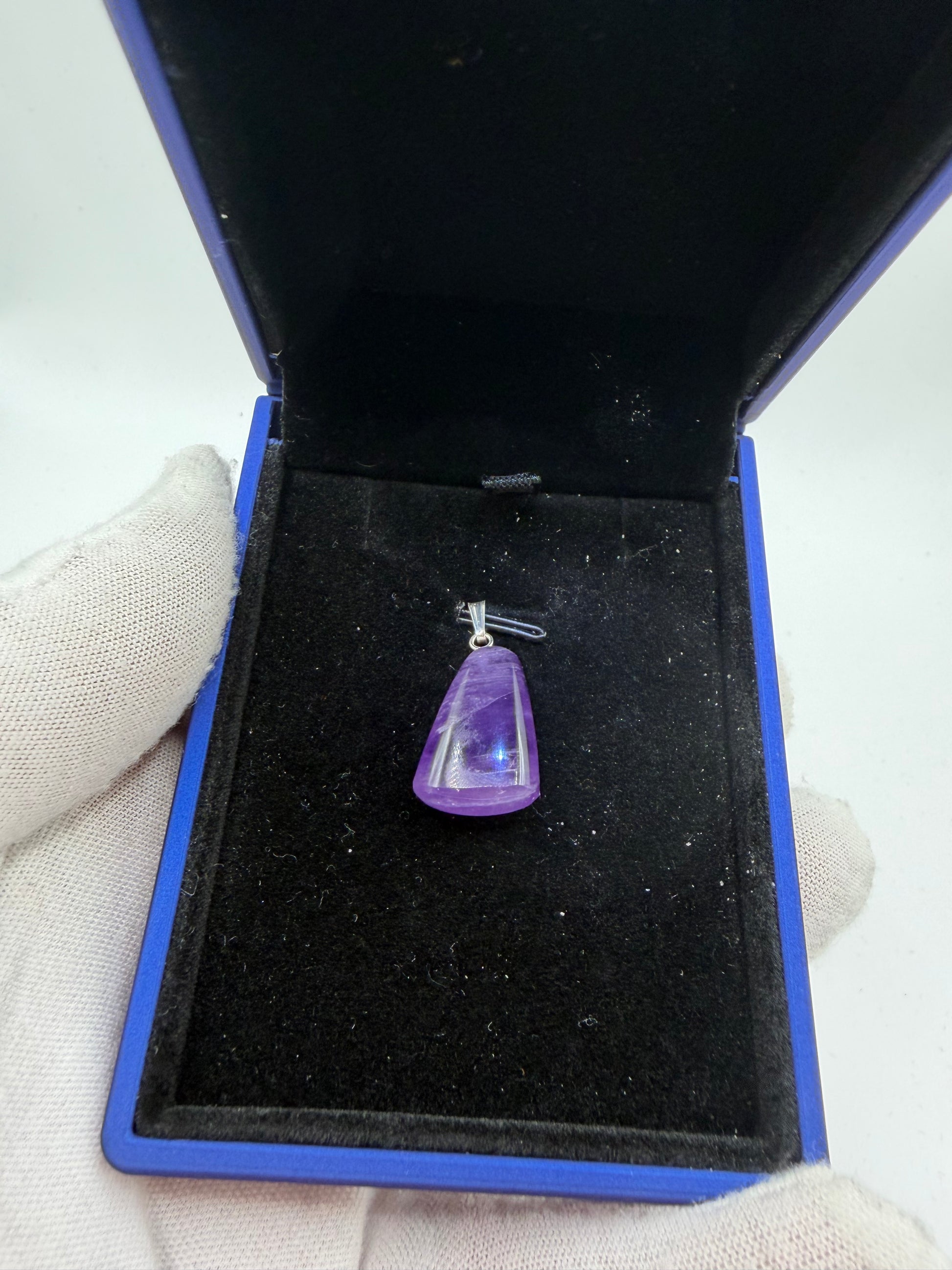21ct Rwandan amethyst pendant close-up showing natural untreated violet color and clarity
