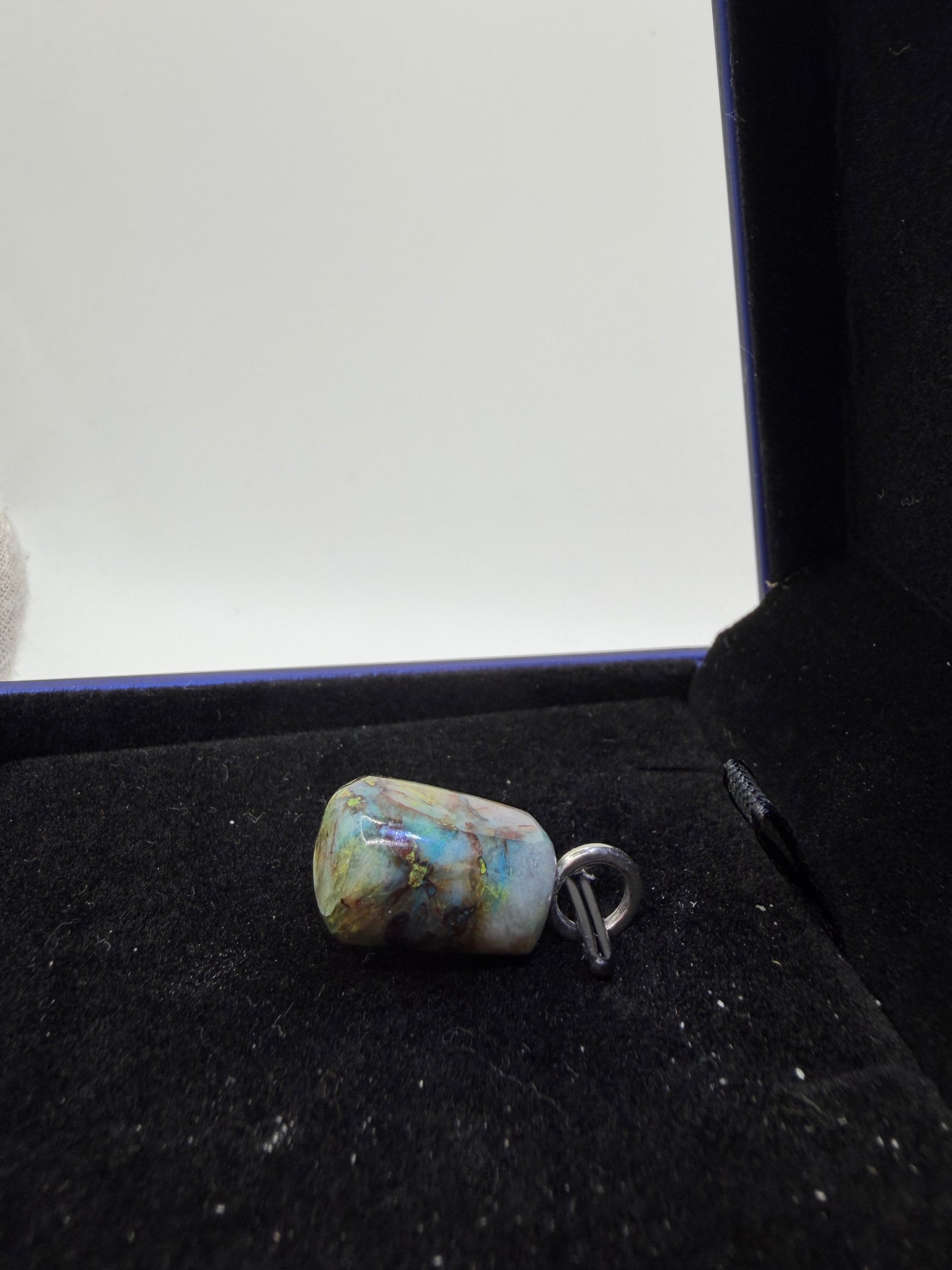 Namibian Quantum Quattro pendant detail showing untreated natural stone texture and color variation