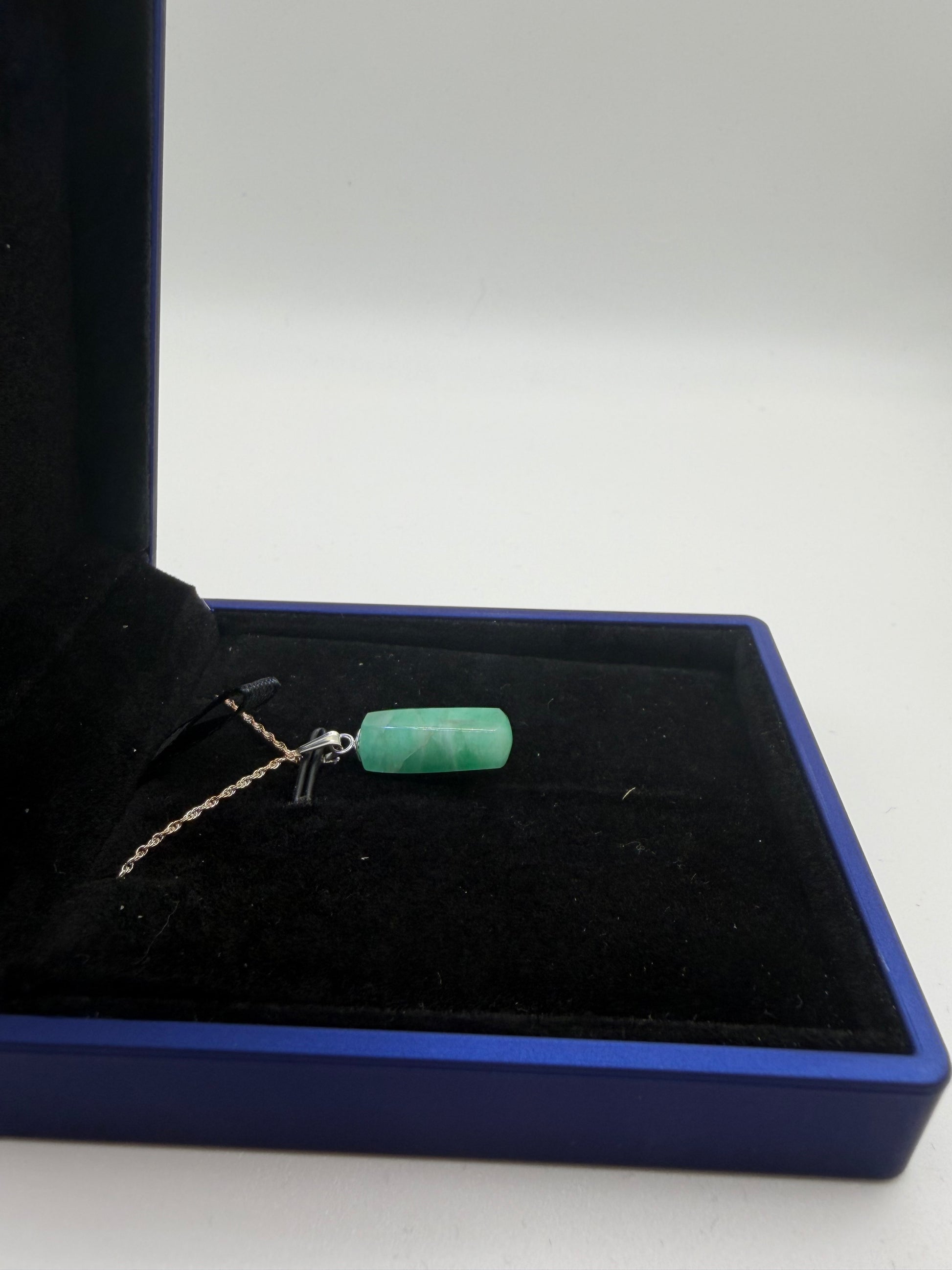 Sterling silver bail and 18 inch 1mm rope chain on 8ct Colombian emerald pendant handcrafted in Maine