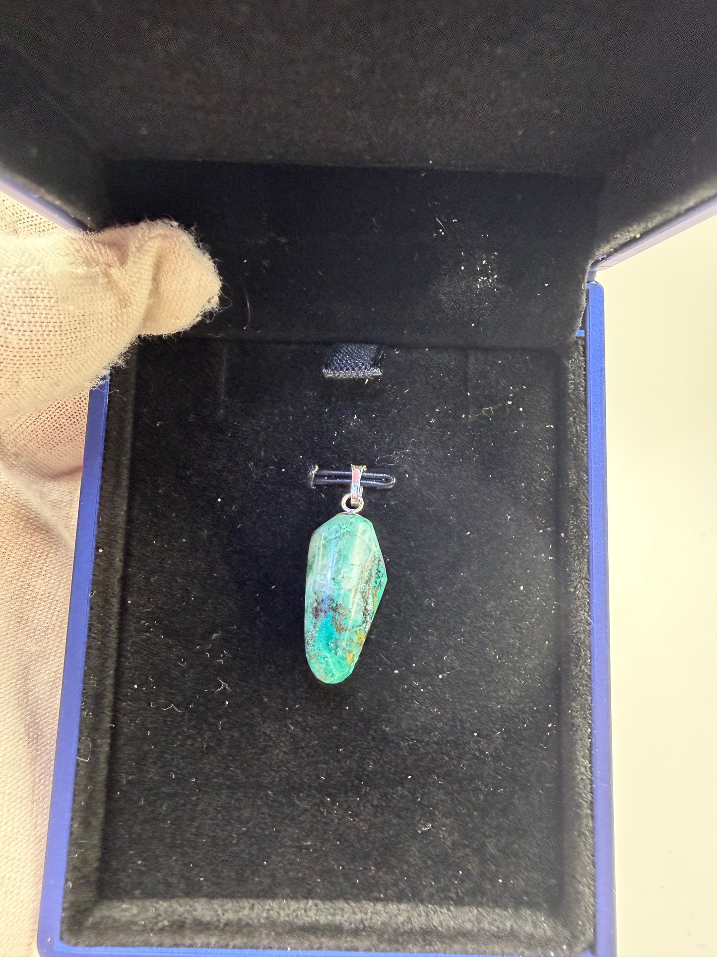 Close-up of 11ct Quantum Quattro pendant showing chrysocolla, malachite, and shattuckite patterning — Jewelry and Gems by Chandler