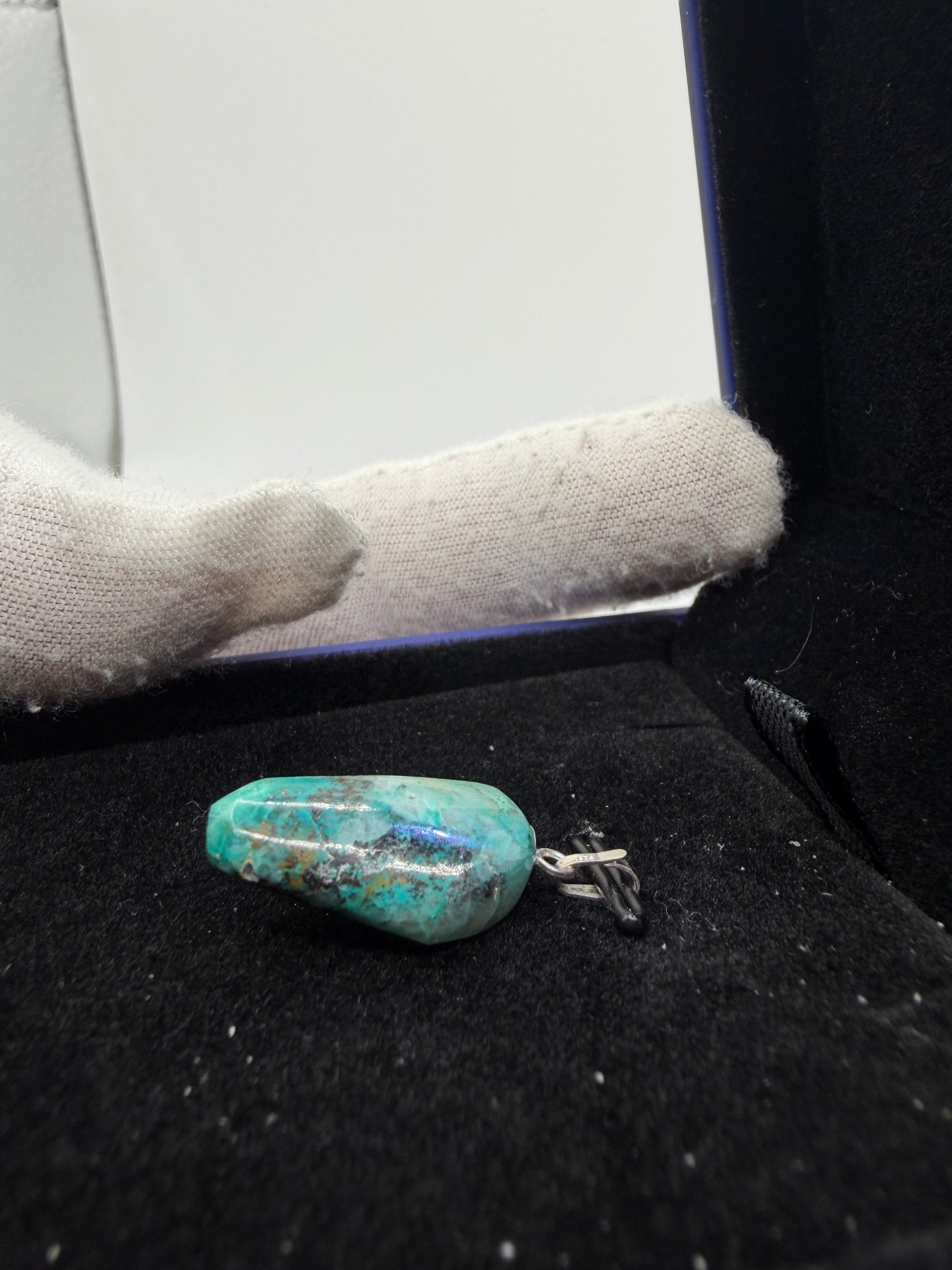 Detail view of 11ct Quantum Quattro pendant stone surface — rare Namibian multi-mineral gemstone pendant