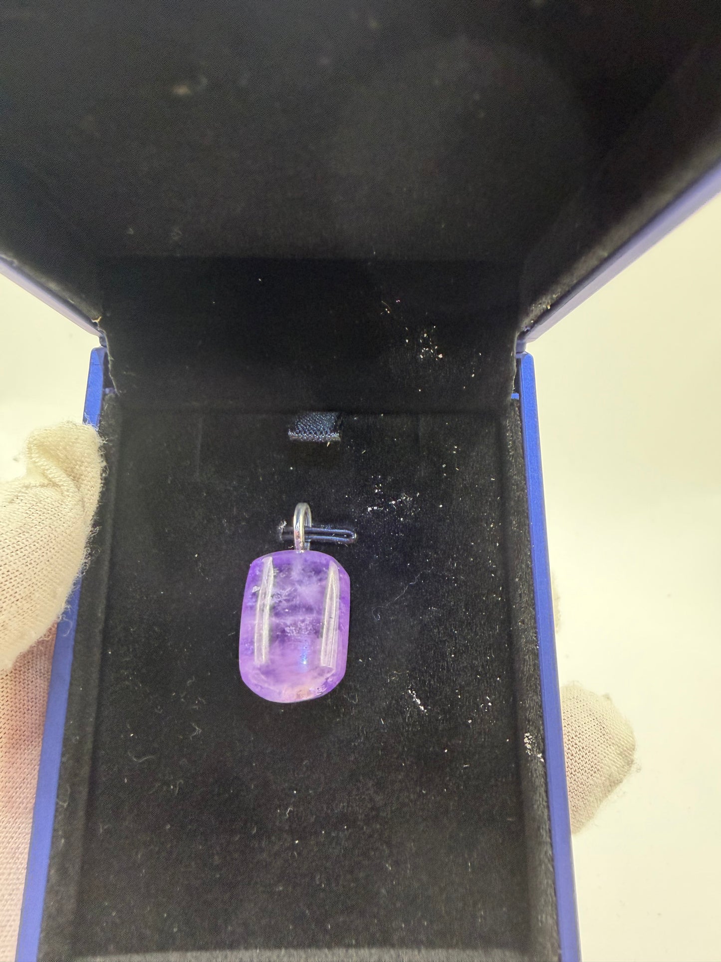 Close-up of 31ct Rwandan Amethyst pendant showing rich violet color and natural clarity — Jewelry and Gems by Chandler