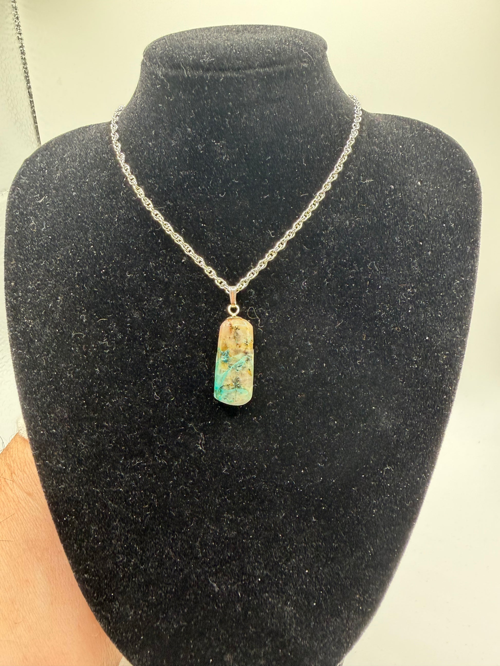 15ct Namibian Quantum Quattro pendant with drill bail, showing vibrant blue-green chrysocolla and shattuckite gemstone, handcrafted by Jewelry and Gems by Chandler