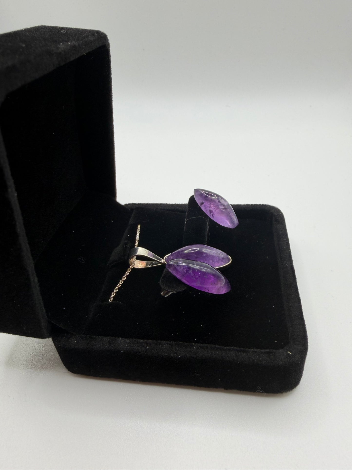 Rwandan Amethyst slender oval pendant and earring set in black display box