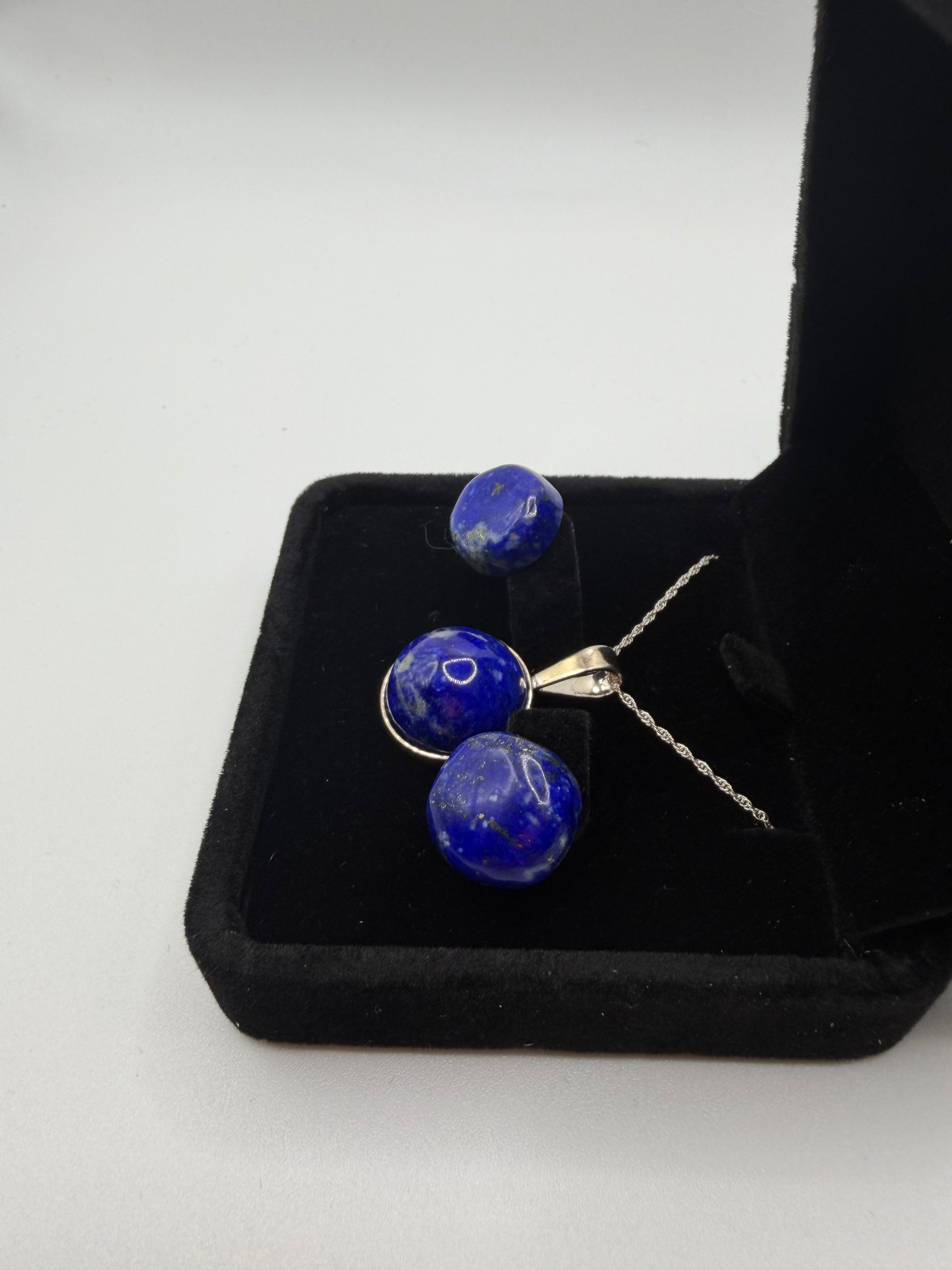 Lapis lazuli pendant and earring set in black display box