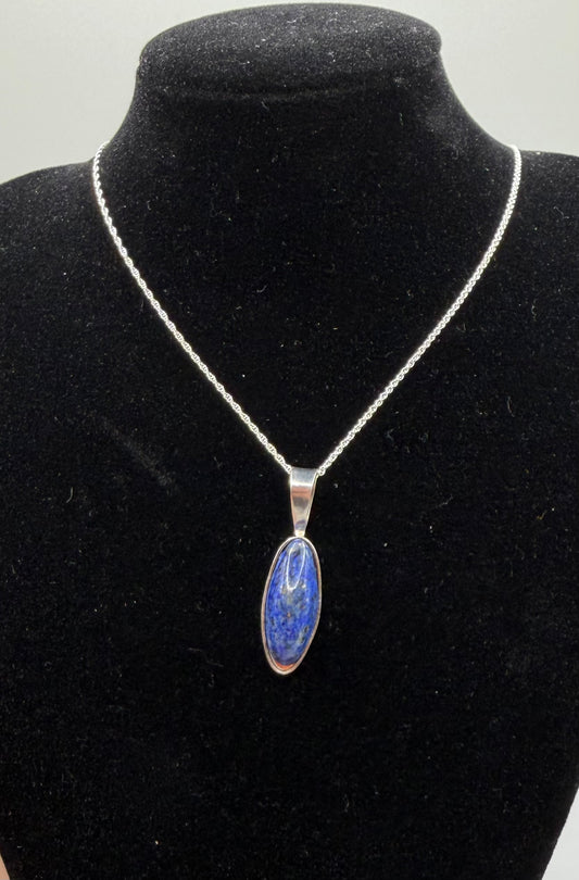 Slender oval Lapis Lazuli pendant handcrafted in Maine sterling silver with 18 inch chain included