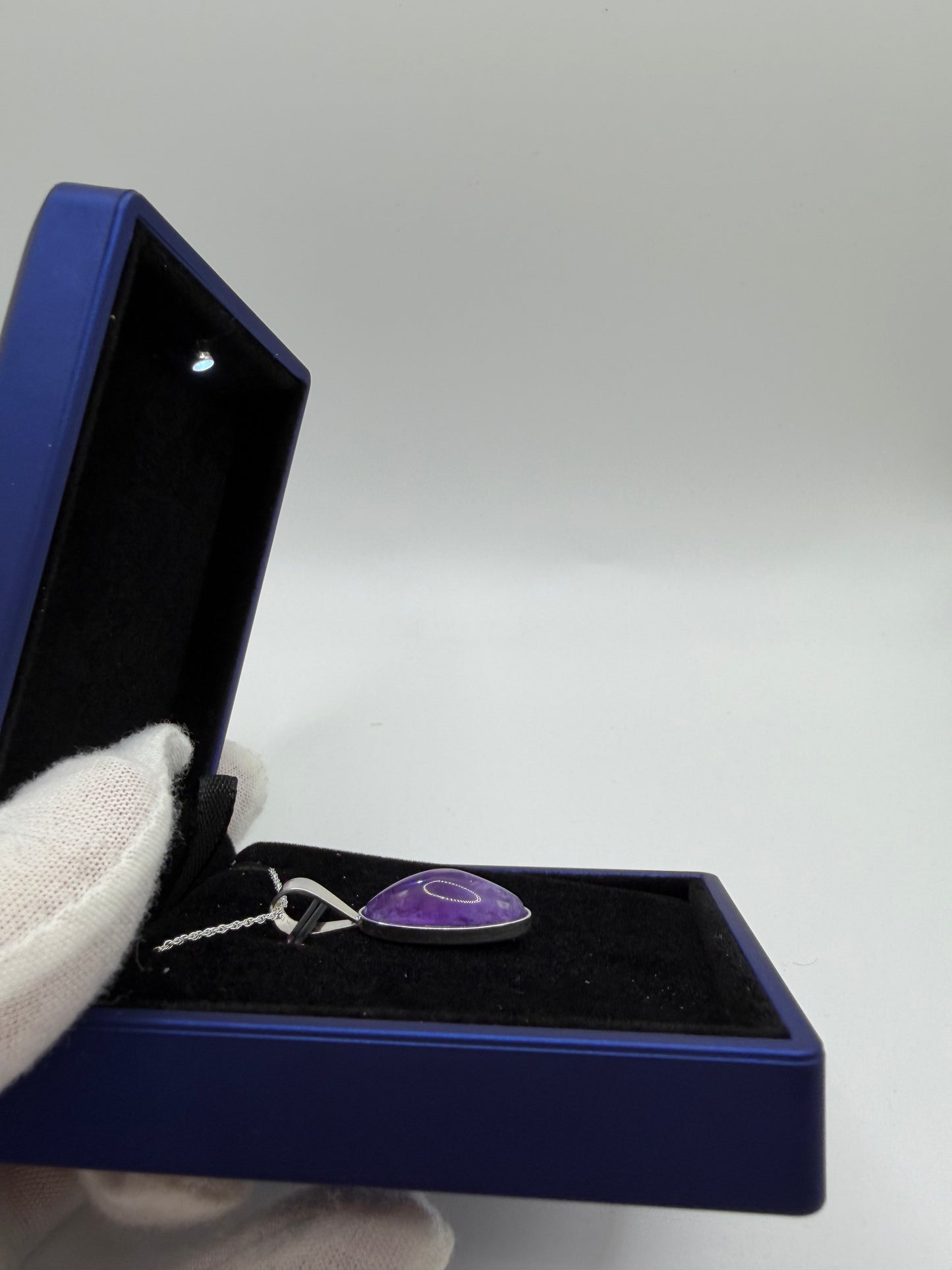 Sterling silver bail and 18 inch 1mm rope chain on slender oval Rwandan Amethyst pendant handcrafted in Maine