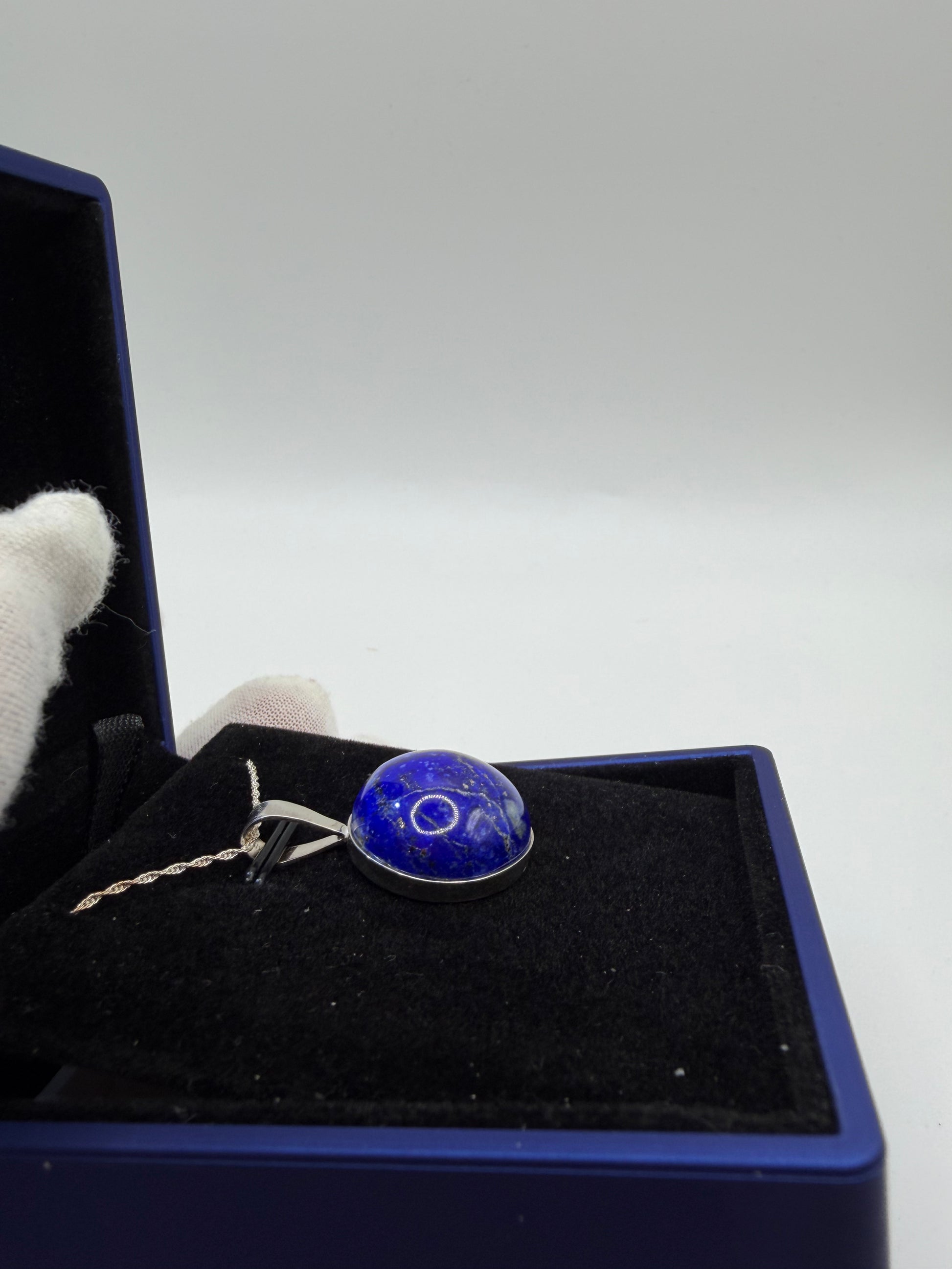 Sterling silver bail and 18 inch 1mm rope chain on 20mm lapis lazuli pendant handcrafted in Maine