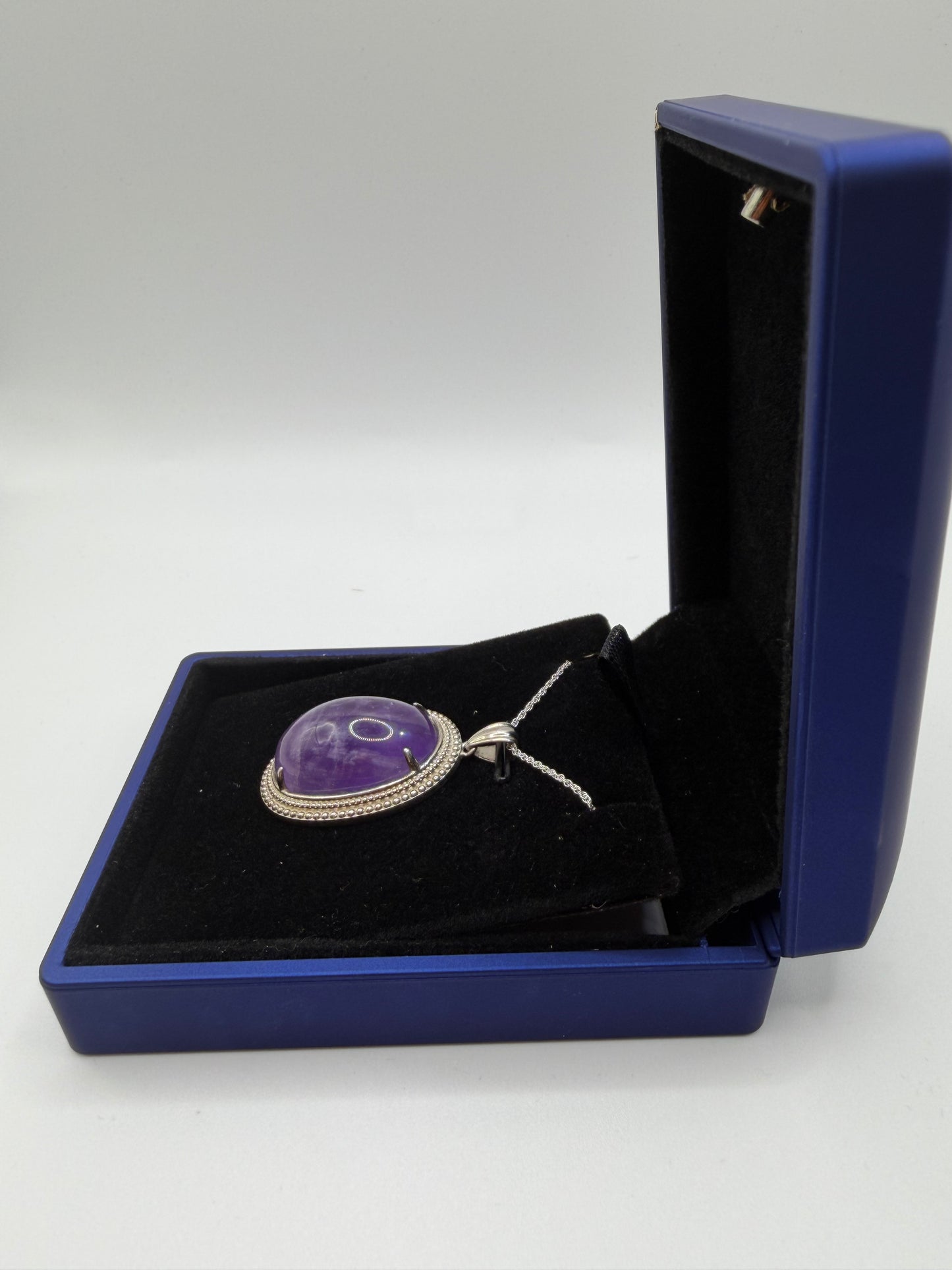 Sterling silver bail and 18 inch 1mm rope chain on Rwandan Amethyst pendant handcrafted in Maine
