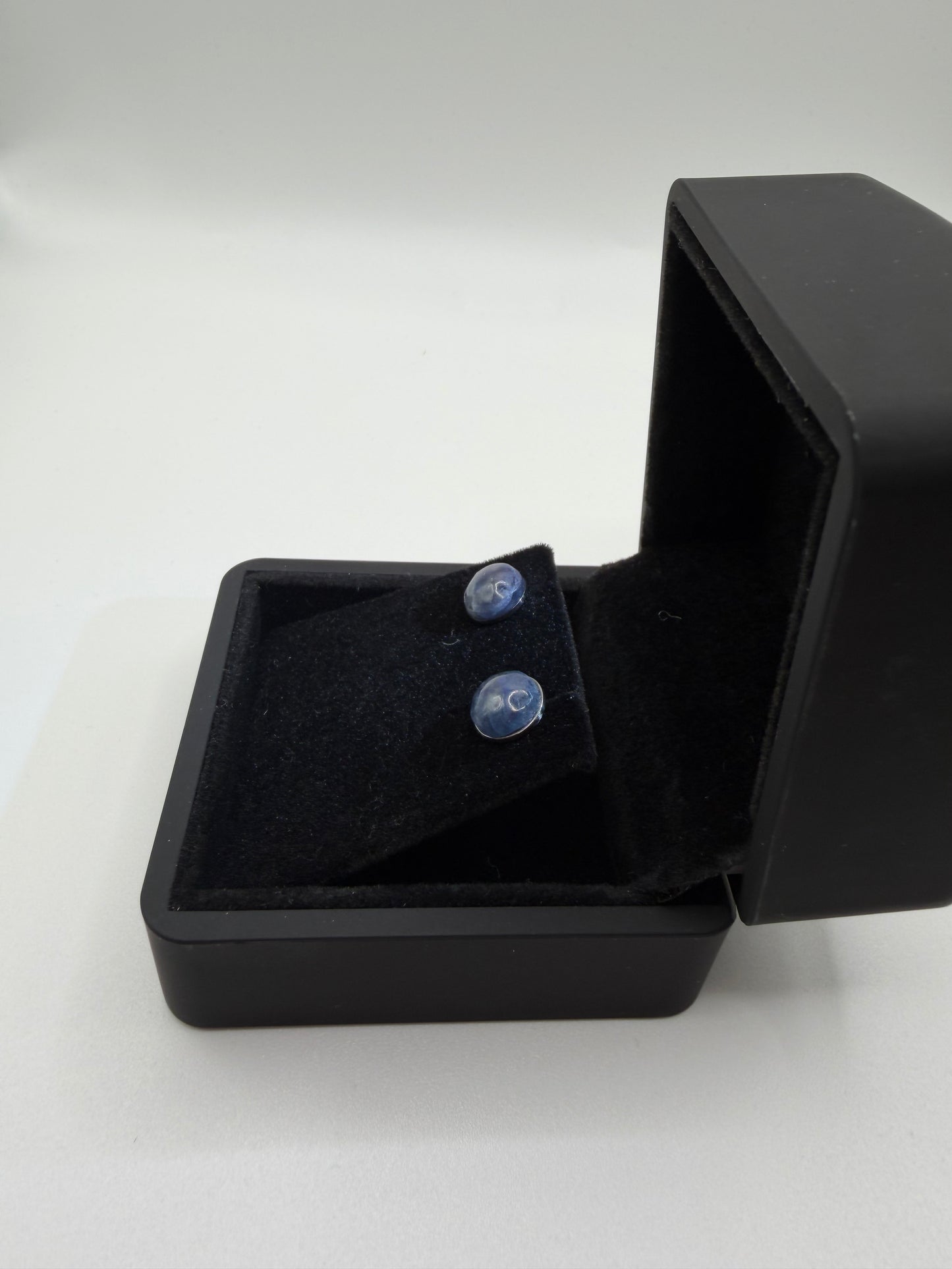 Pair of 8mm low-grade sapphire titanium stud earrings – lightweight and hypoallergenic