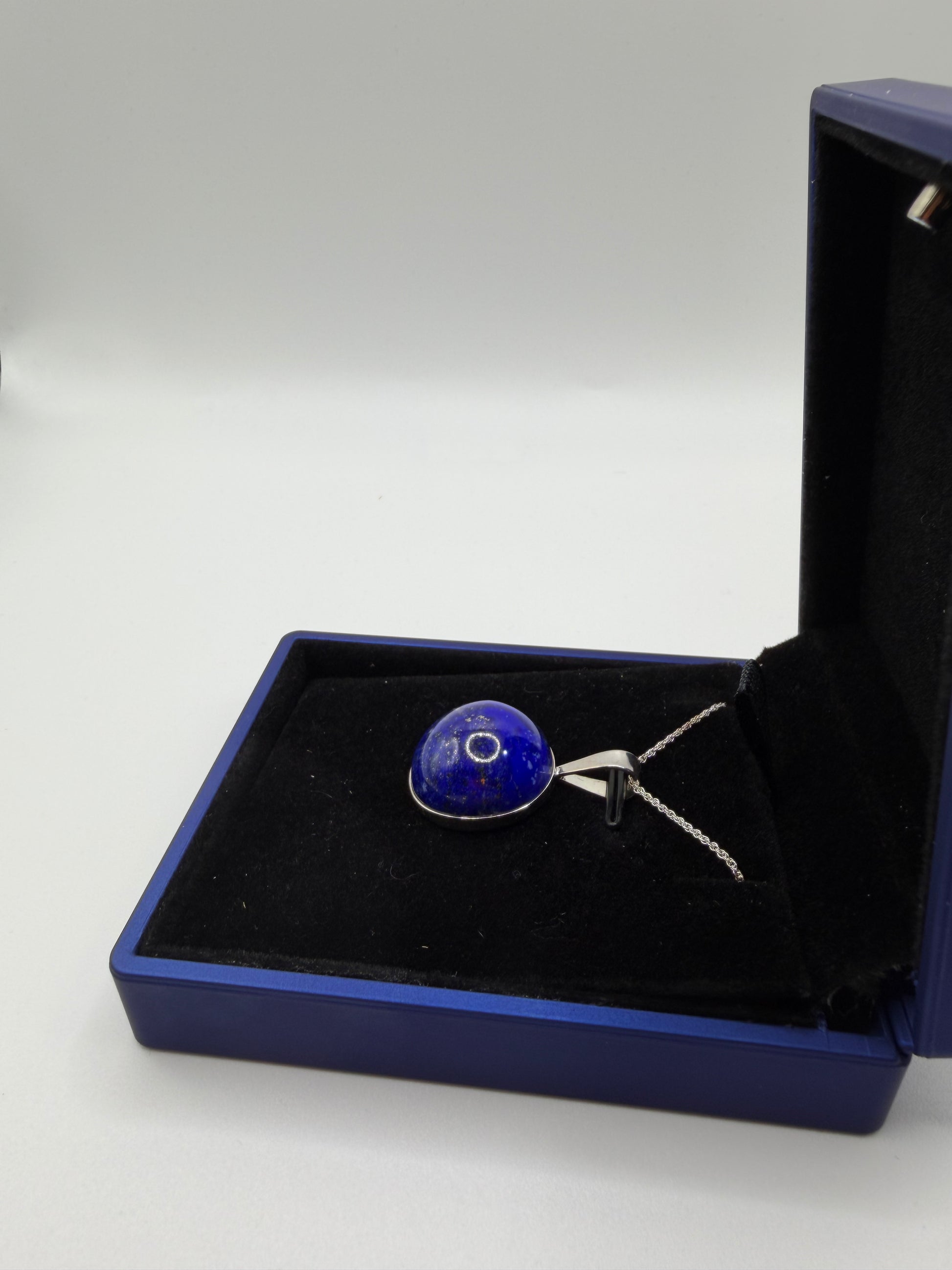 Sterling silver bail and 18 inch 1mm rope chain on 20mm lapis lazuli pendant handcrafted in Maine