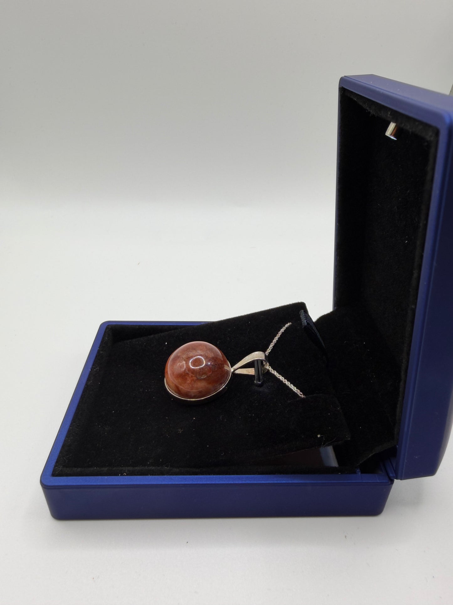 Sterling silver bail and 18 inch 1mm rope chain on 20mm Hartland Carnelian pendant handcrafted in Maine