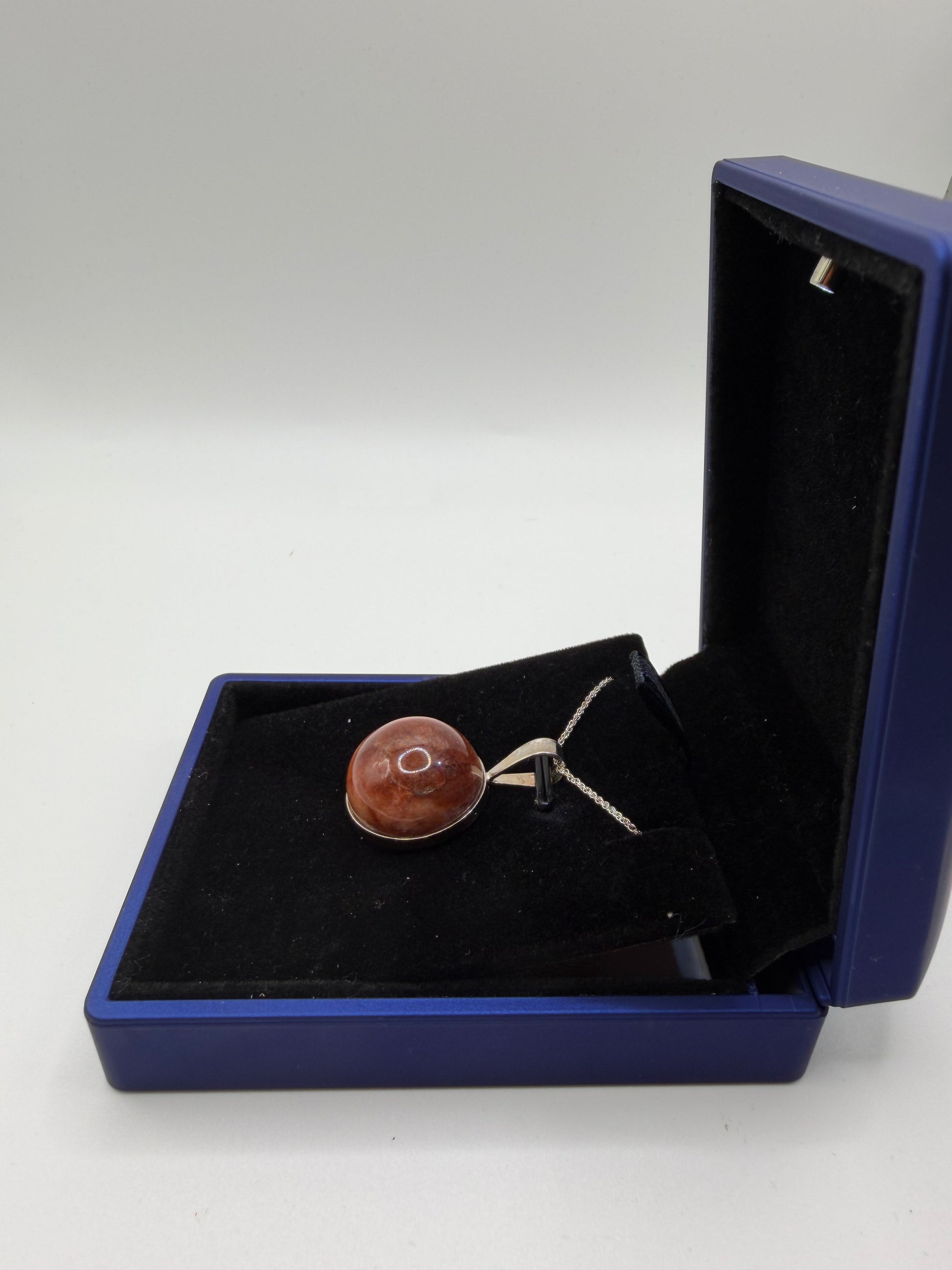 Sterling silver bail and 18 inch 1mm rope chain on 20mm Hartland Carnelian pendant handcrafted in Maine