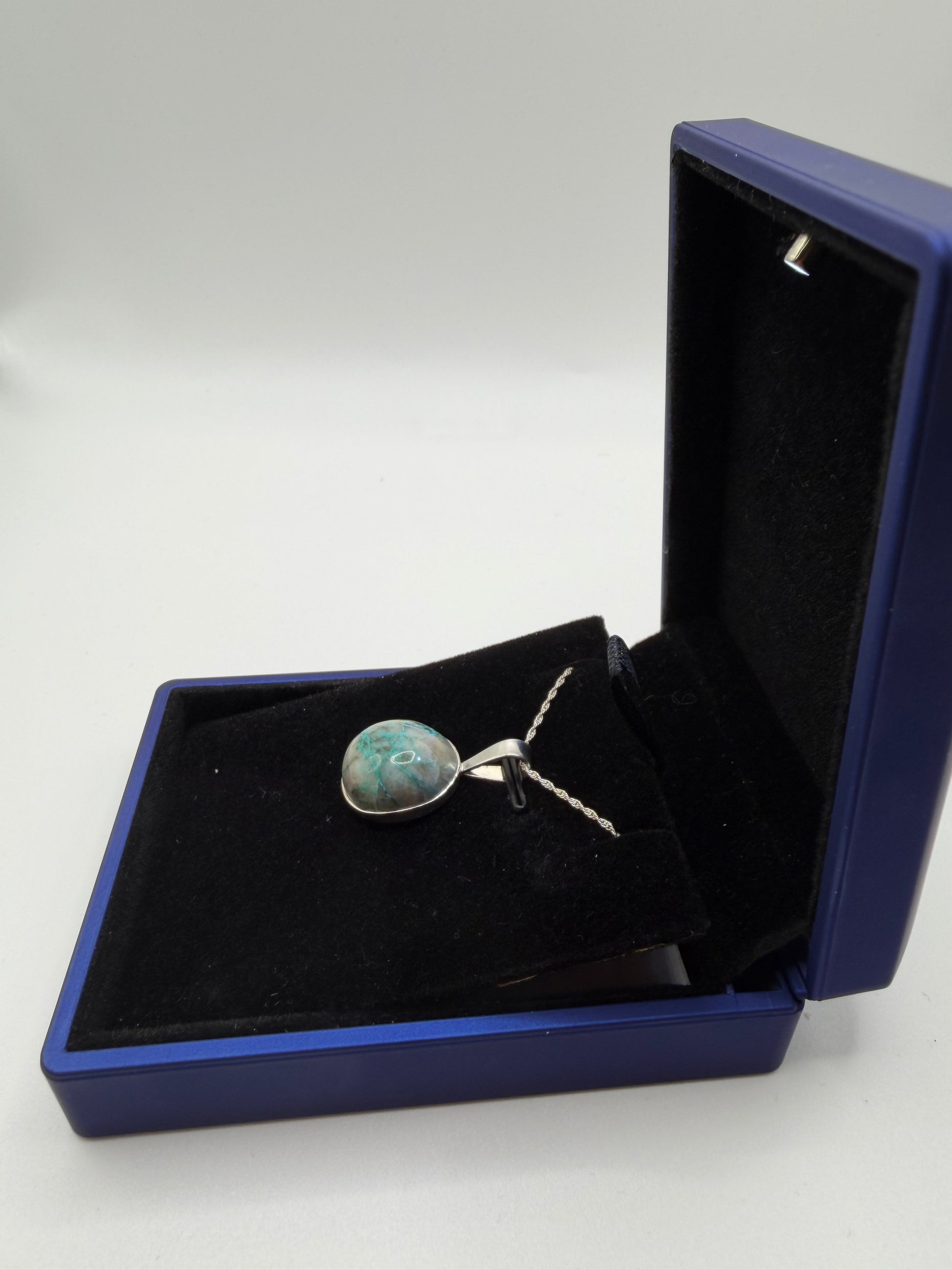 Natural untreated Quantum Quattro mix (Shattuckite, Chrysocolla, Malachite in quartz) before setting in pendant