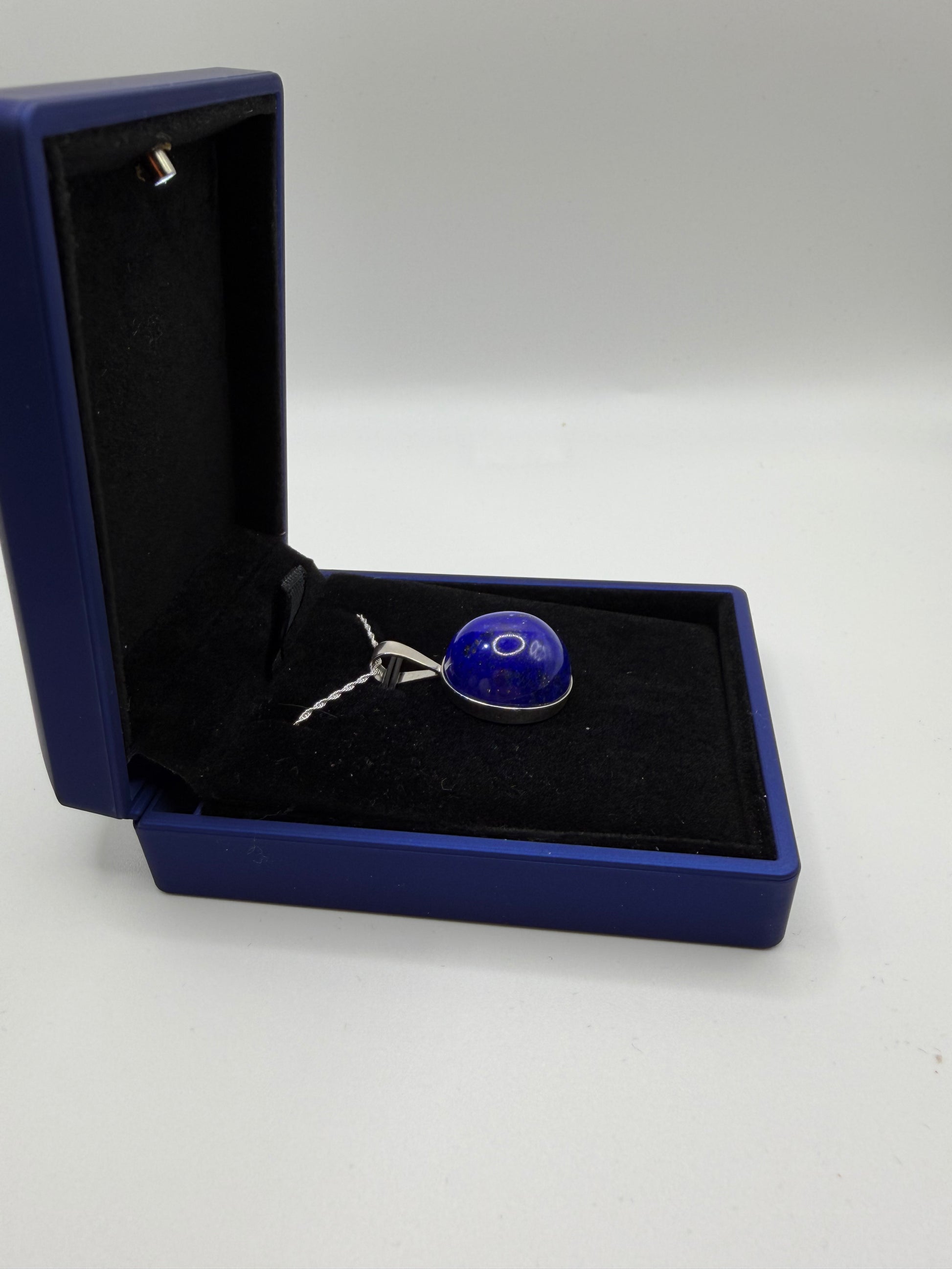 Sterling silver bail and 18 inch 1mm rope chain on 20mm lapis lazuli pendant handcrafted in Maine