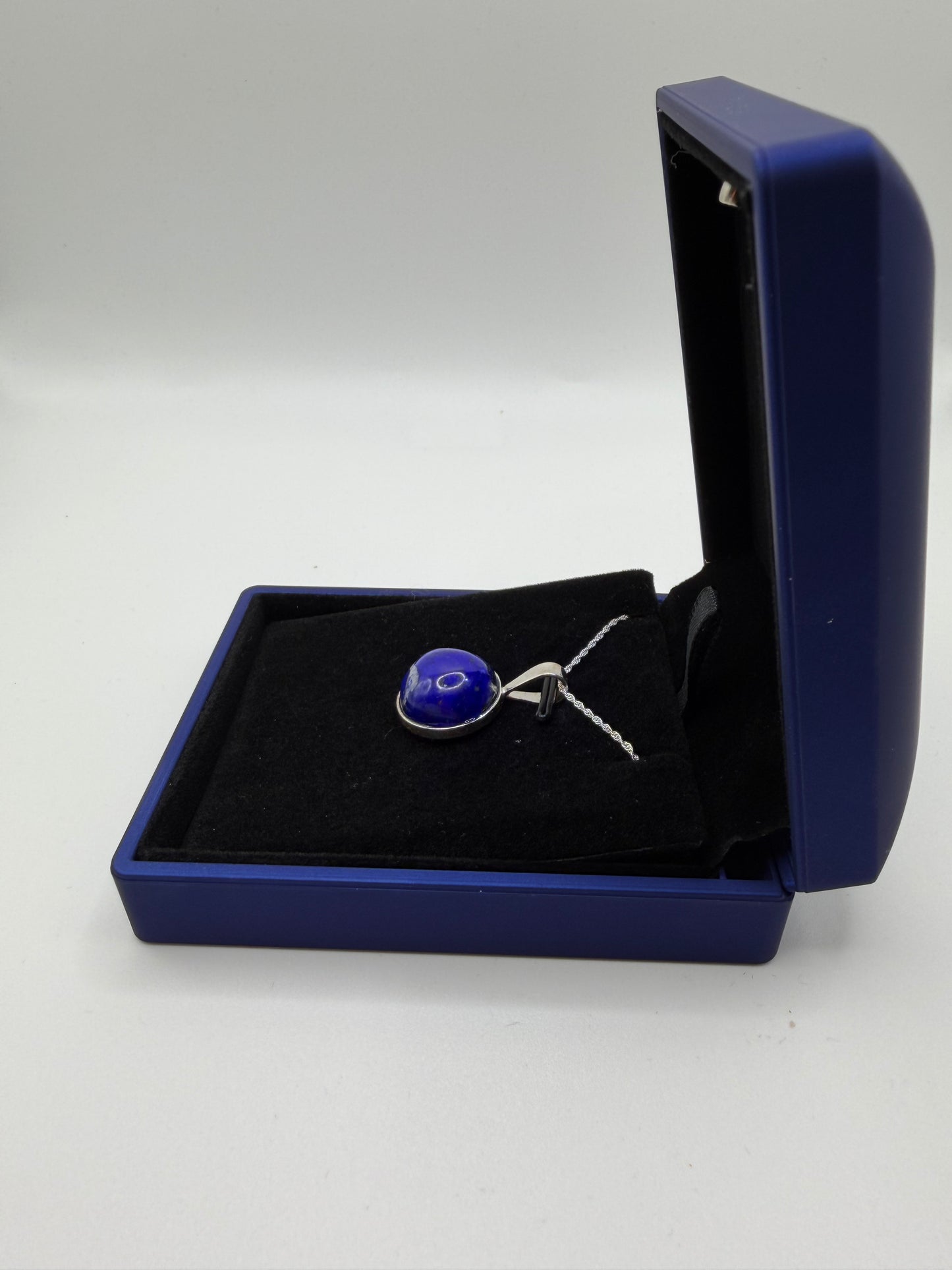 Sterling silver bail and chain on 16mm lapis lazuli pendant handcrafted in Maine