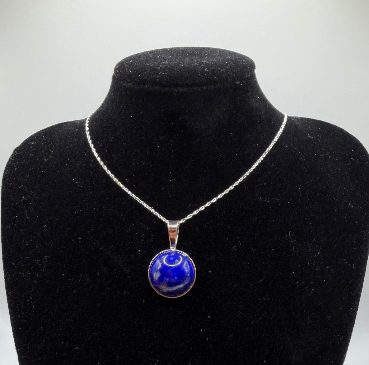 16mm Lapis Lazuli pendant handcrafted in Maine sterling silver setting with golden pyrite flecks